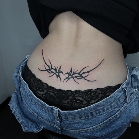 Tramp Stamp Tattoo History Modern Trends And Design Ideas Vean Tattoo